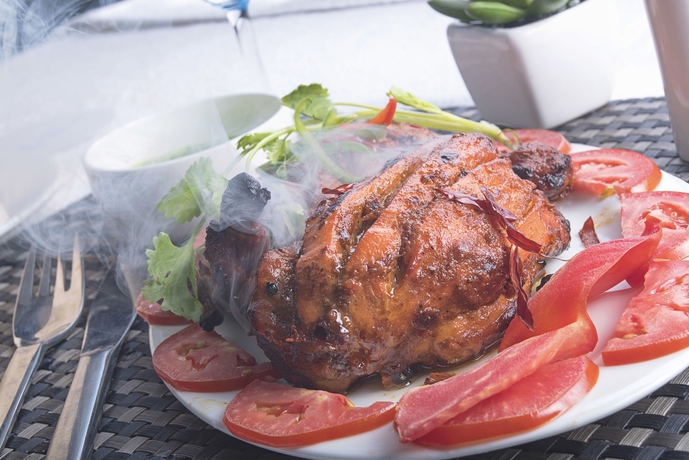 Imagen del bar/restaurante del Hotel Regenta Inn Larica. Foto 7