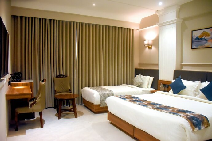 Imagen de la habitación del Hotel Regenta Inn Motikhavdi Jamnagar. Foto 20