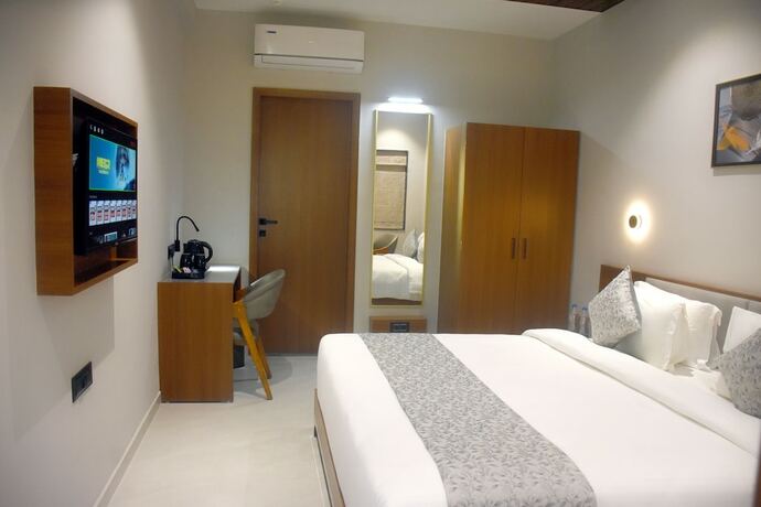 Imagen de la habitación del Hotel Regenta Inn Motikhavdi Jamnagar. Foto 22