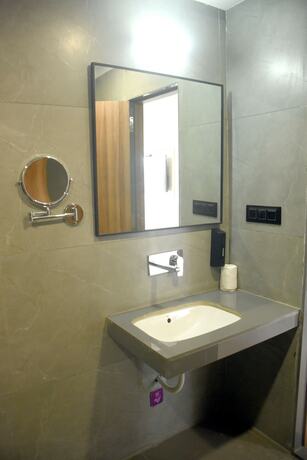 Imagen de la habitación del Hotel Regenta Inn Motikhavdi Jamnagar. Foto 23