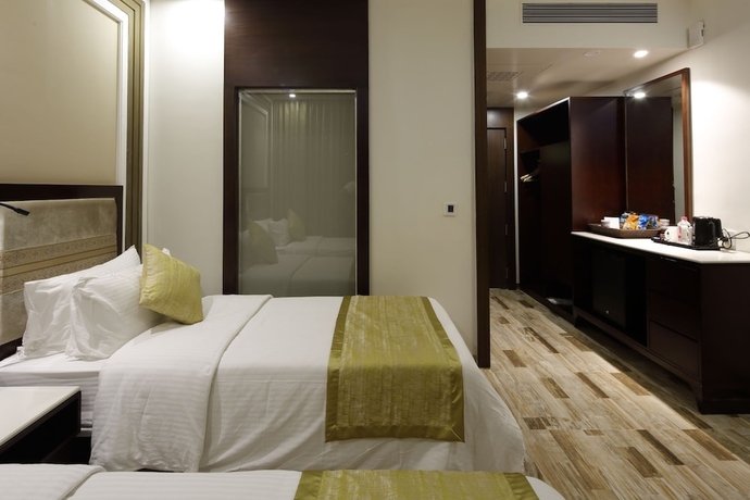 Imagen de la habitación del Hotel Regenta Inn Ranip Ahmedabad. Foto 4