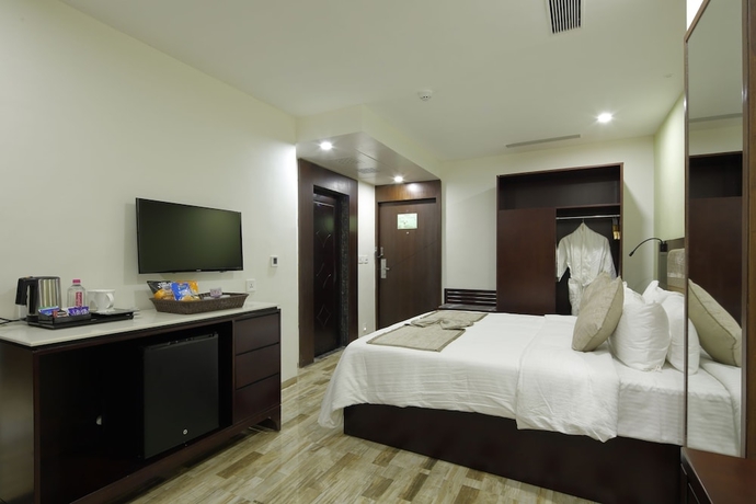 Imagen de la habitación del Hotel Regenta Inn Ranip Ahmedabad. Foto 5