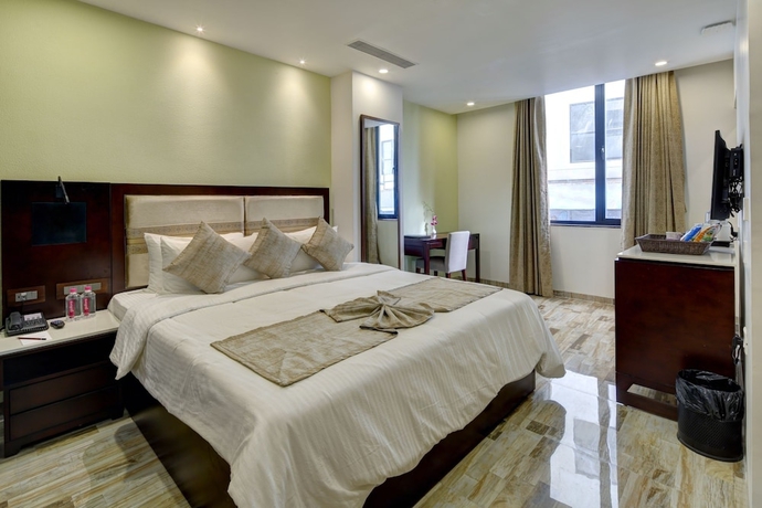 Imagen de la habitación del Hotel Regenta Inn Ranip Ahmedabad. Foto 6