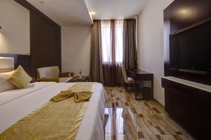 Imagen de la habitación del Hotel Regenta Inn Ranip Ahmedabad. Foto 7