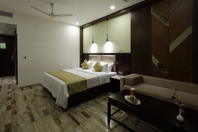 Imagen de la habitación del Hotel Regenta Inn Ranip Ahmedabad. Foto 9