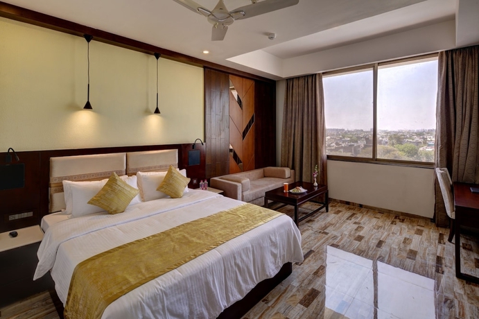 Imagen de la habitación del Hotel Regenta Inn Ranip Ahmedabad. Foto 10