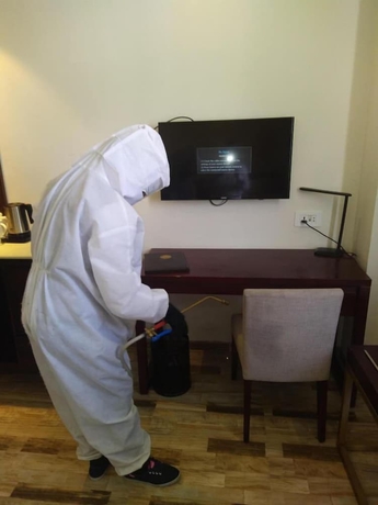 Imagen de la habitación del Hotel Regenta Inn Ranip Ahmedabad. Foto 13