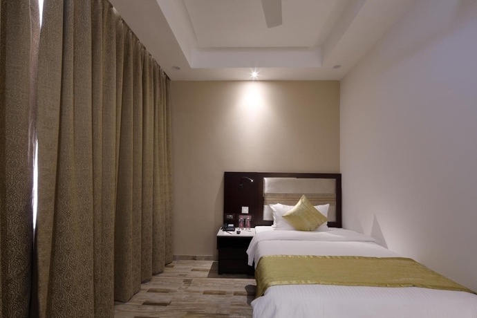 Imagen de la habitación del Hotel Regenta Inn Ranip Ahmedabad. Foto 15