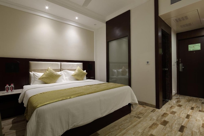 Imagen de la habitación del Hotel Regenta Inn Ranip Ahmedabad. Foto 16
