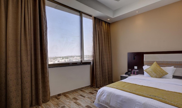 Imagen de la habitación del Hotel Regenta Inn Ranip Ahmedabad. Foto 17