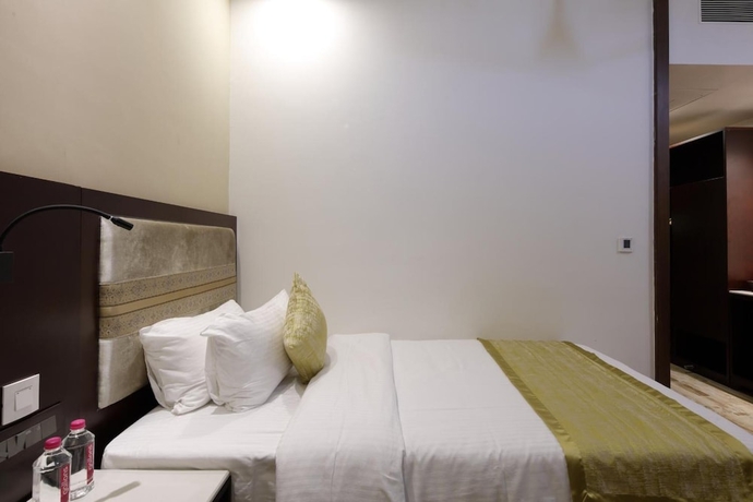 Imagen de la habitación del Hotel Regenta Inn Ranip Ahmedabad. Foto 18