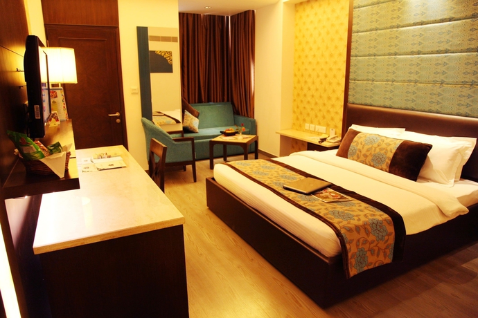 Imagen de la habitación del Hotel Regenta Orko's Haridwar. Foto 9