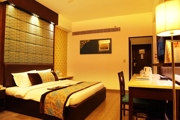 Imagen de la habitación del Hotel Regenta Orko's Haridwar. Foto 10
