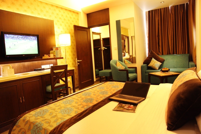 Imagen de la habitación del Hotel Regenta Orko's Haridwar. Foto 11