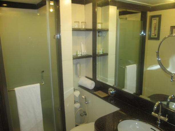 Imagen de la habitación del Hotel Regenta Orko's Haridwar. Foto 17