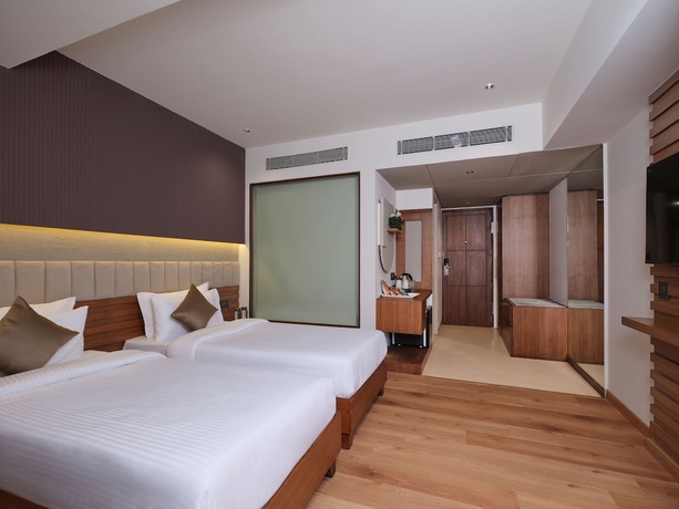Imagen de la habitación del Hotel Regenta Place Ahmedabad. Foto 2