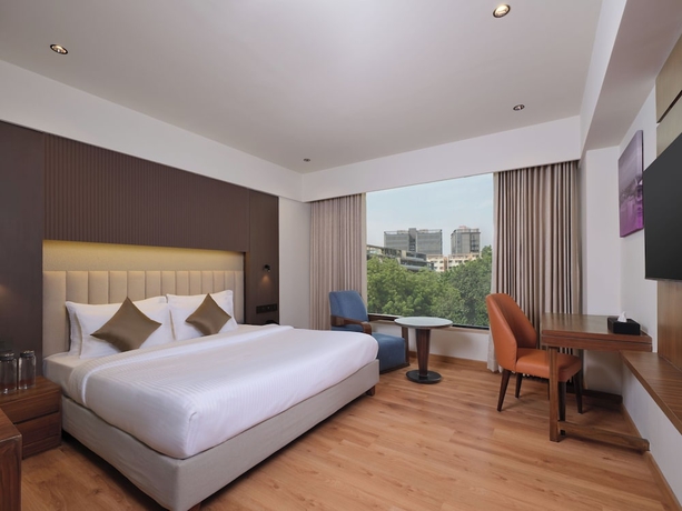 Imagen de la habitación del Hotel Regenta Place Ahmedabad. Foto 3