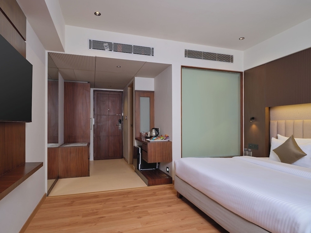 Imagen de la habitación del Hotel Regenta Place Ahmedabad. Foto 4