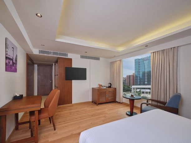 Imagen de la habitación del Hotel Regenta Place Ahmedabad. Foto 6