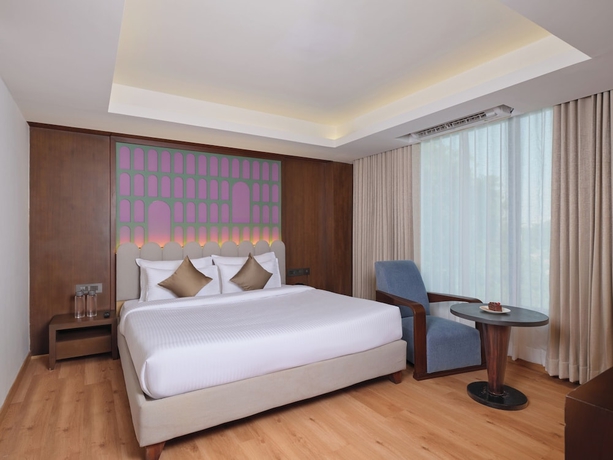 Imagen de la habitación del Hotel Regenta Place Ahmedabad. Foto 7