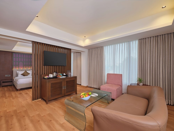 Imagen de la habitación del Hotel Regenta Place Ahmedabad. Foto 8