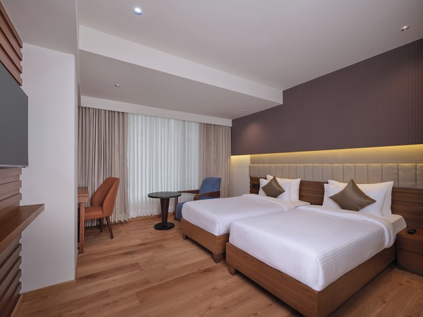 Imagen de la habitación del Hotel Regenta Place Ahmedabad. Foto 9