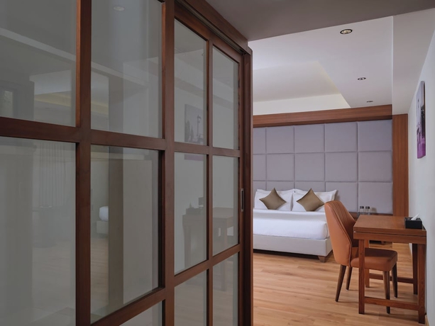Imagen de la habitación del Hotel Regenta Place Ahmedabad. Foto 10