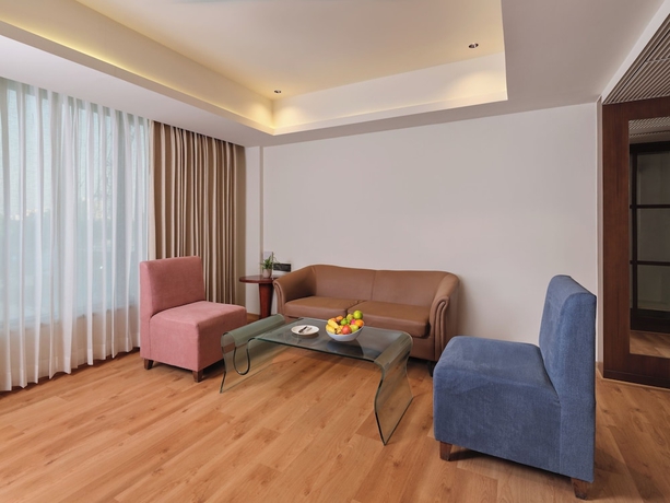Imagen de la habitación del Hotel Regenta Place Ahmedabad. Foto 11
