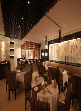 Imagen del bar/restaurante del Hotel Regenta Place Amritsar. Foto 6