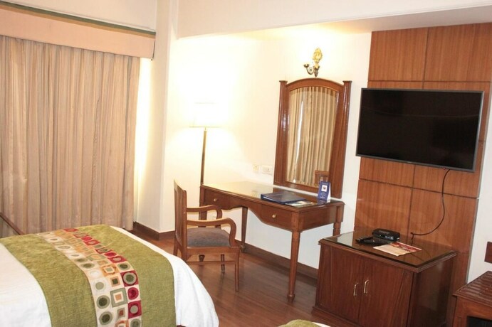 Imagen de la habitación del Hotel Regenta Place Amritsar. Foto 7