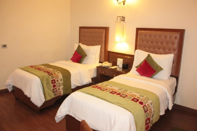 Imagen de la habitación del Hotel Regenta Place Amritsar. Foto 9