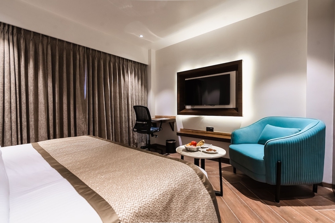 Imagen de la habitación del Hotel Regenta Place Igatpuri. Foto 12