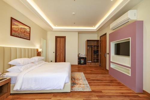 Imagen de la habitación del Hotel Regenta Place Jaipur Sirsi Road, Opp Alankar PG College. Foto 18