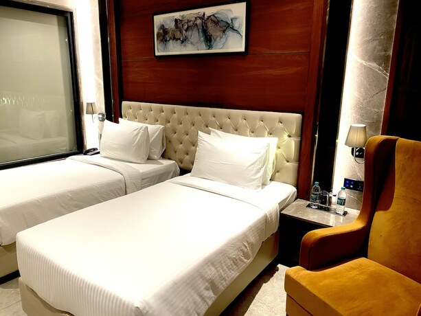 Imagen de la habitación del Hotel Regenta Place Mohali. Foto 17