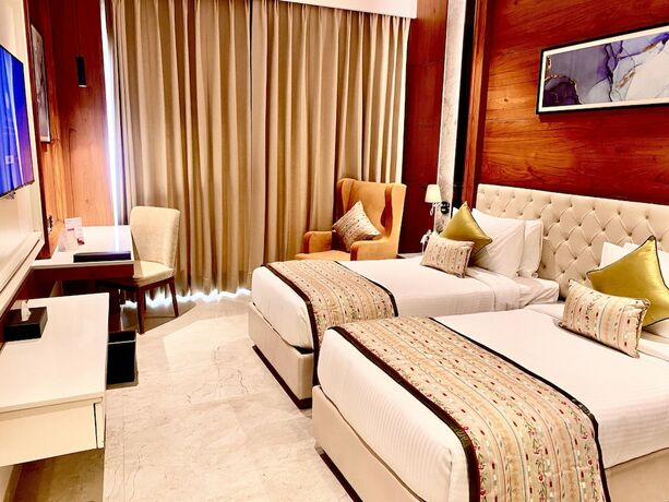 Imagen de la habitación del Hotel Regenta Place Mohali. Foto 20