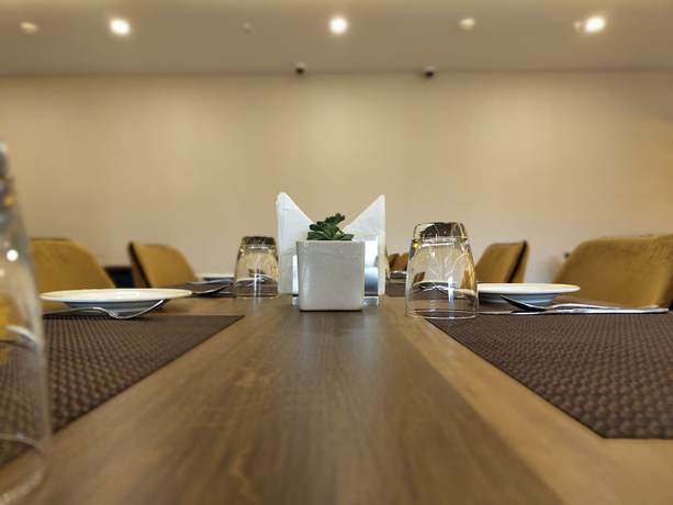 Imagen del bar/restaurante del Hotel Regenta Place Phagwara by Royal Orchids Limited. Foto 1