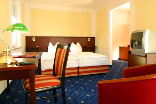 Imagen de la habitación del Hotel Regentpark Munich Airport. Foto 10