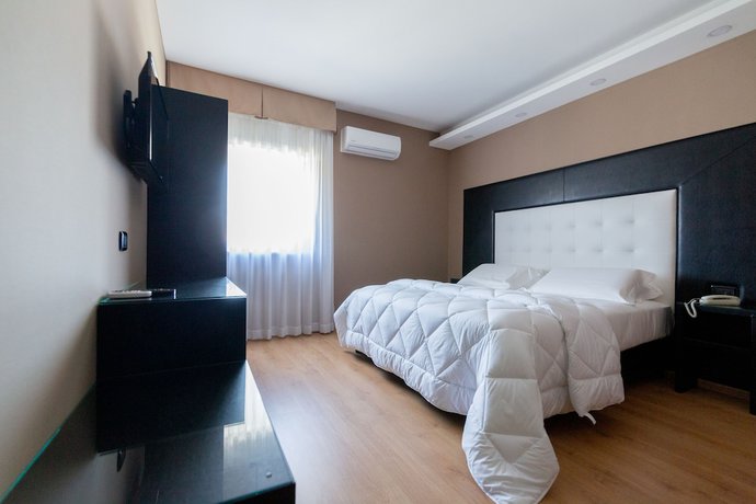 Imagen de la habitación del Hotel Reggia Suite Spa. Foto 7