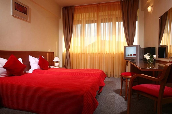 Imagen de la habitación del Hotel Reghina Hotel. Foto 4