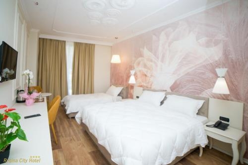Imagen de la habitación del Hotel Regina City. Foto 8