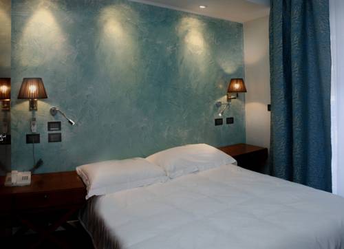 Imagen de la habitación del Hotel Regina, Grado. Foto 14