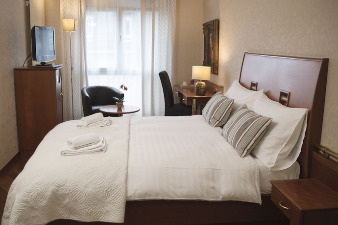 Imagen de la habitación del Hotel Regina, LAUSANA. Foto 12