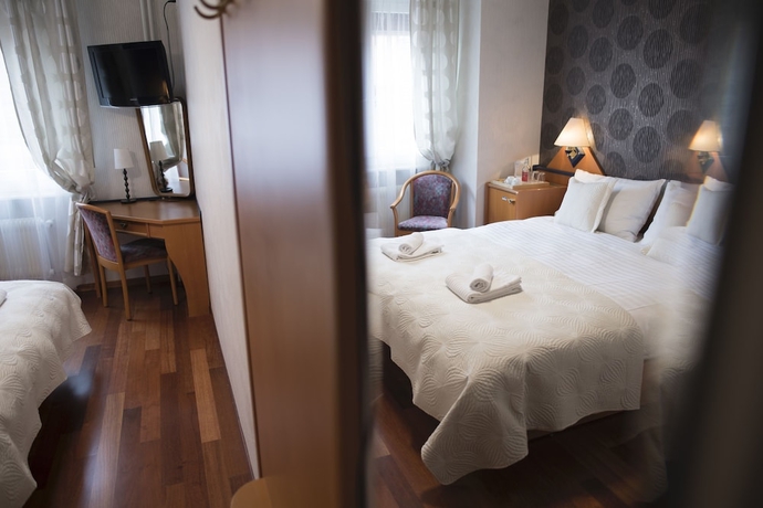 Imagen de la habitación del Hotel Regina, LAUSANA. Foto 14