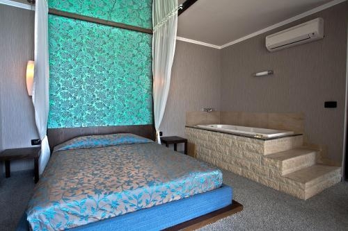 Imagen de la habitación del Hotel Regina Maria Spa Design. Foto 7