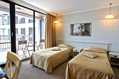 Imagen de la habitación del Hotel Regina Maria Spa Design. Foto 10