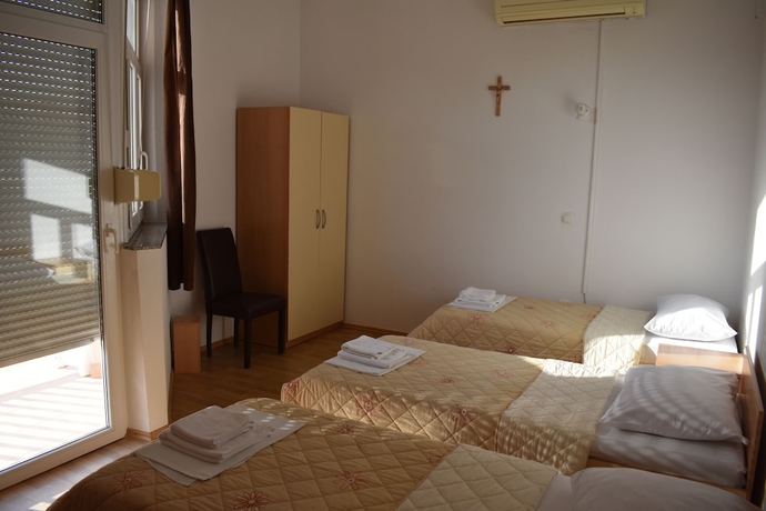 Imagen de la habitación del Hotel Regina Mundi. Foto 6