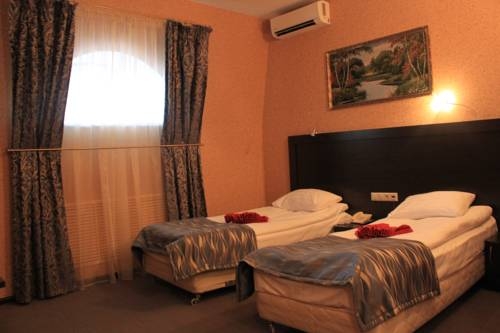 Imagen de la habitación del Hotel Regina On Universitetskaya. Foto 2