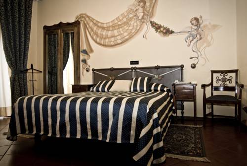 Imagen de la habitación del Hotel Regina, Pinerolo. Foto 2