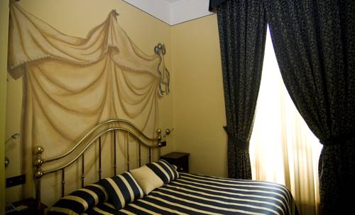 Imagen de la habitación del Hotel Regina, Pinerolo. Foto 4