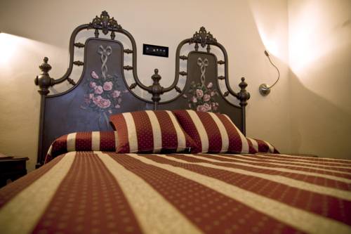 Imagen de la habitación del Hotel Regina, Pinerolo. Foto 6